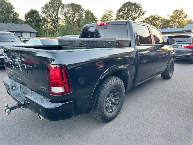 1C6RR7YT3JS199417 - 2018 RAM 1500 REBEL Grau Foto 4