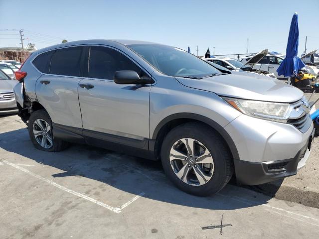 2HKRW5H32JH412328 - 2018 HONDA CR-V LX ვერცხლისფერი ფოტო 4