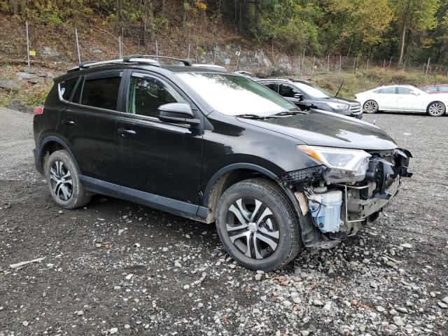 2T3BFREVXJW719706 - 2018 TOYOTA RAV4 LE Schwarz Foto 4