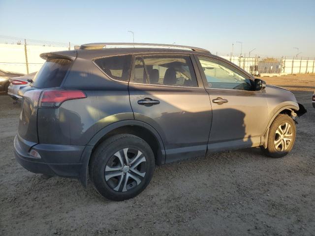 2T3ZFREV7JW497365 - 2018 TOYOTA RAV4 LE رمادي صورة 3