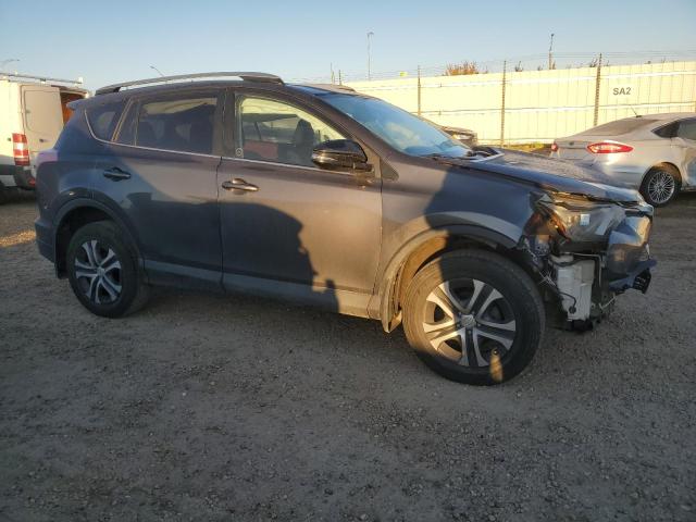 2T3ZFREV7JW497365 - 2018 TOYOTA RAV4 LE رمادي صورة 4