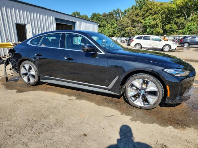 WBY43AW09RFT15359 - 2024 BMW I4 EDRIVE 35 CHARCOAL photo 4