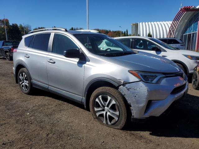 2T3BFREV5HW659215 - 2017 TOYOTA RAV4 LE SILVER photo 4