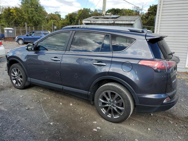 JTMDFREV5JJ175848 - 2018 TOYOTA RAV4 LIMITED GRAY photo 2