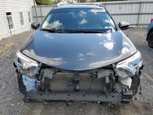 JTMDFREV5JJ175848 - 2018 TOYOTA RAV4 LIMITED GRAY photo 5