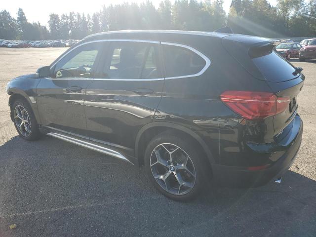 WBXHT3C51K3H34284 - 2019 BMW X1 XDRIVE28I შავი ფოტო 2