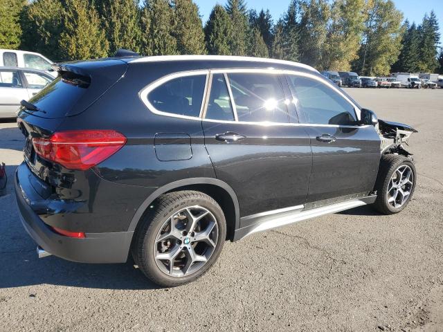 WBXHT3C51K3H34284 - 2019 BMW X1 XDRIVE28I შავი ფოტო 3