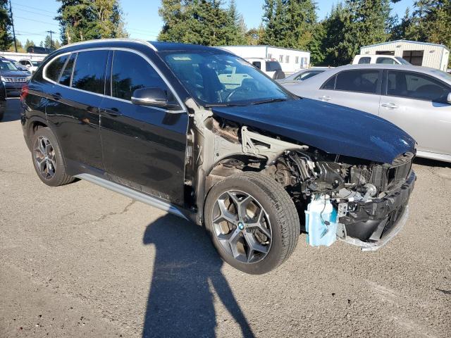 WBXHT3C51K3H34284 - 2019 BMW X1 XDRIVE28I შავი ფოტო 4