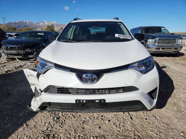 JTMBFREVXGD177755 - 2016 TOYOTA RAV4 LE WHITE photo 5