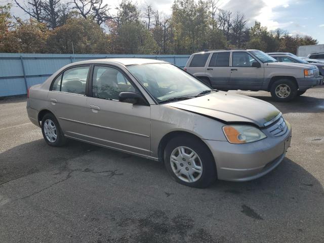2HGES16502H590502 - 2002 HONDA CIVIC LX TAN photo 4