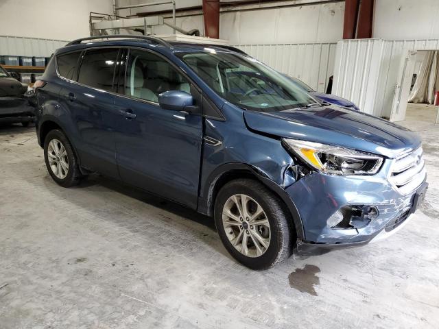 1FMCU9GD5JUB18906 - 2018 FORD ESCAPE SE BLUE photo 4