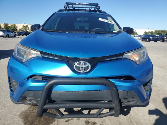 JTMZFREV6GD089414 - 2016 TOYOTA RAV4 LE ლურჯი ფოტო 5