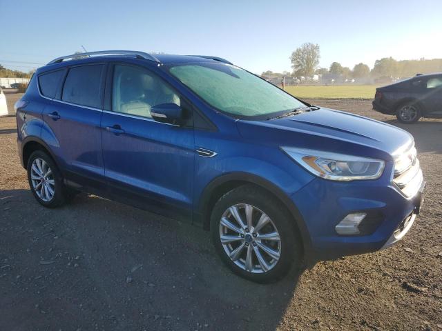 1FMCU9J96HUA10292 - 2017 FORD ESCAPE TITANIUM BLUE photo 4