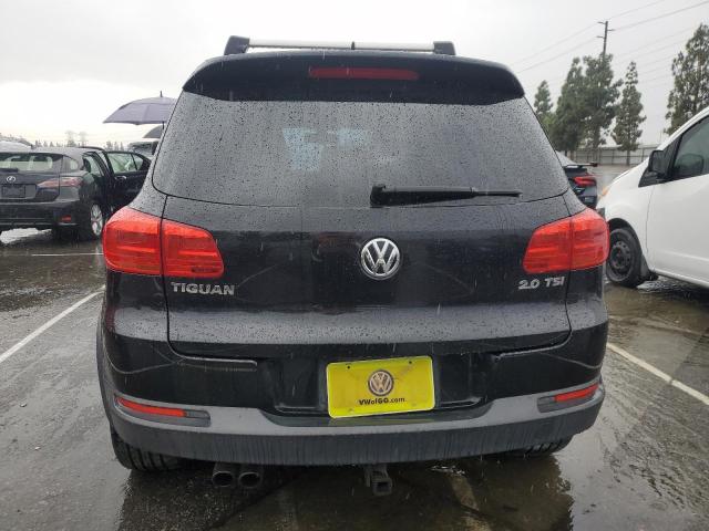 WVGAV3AX2EW010242 - 2014 VOLKSWAGEN TIGUAN S BLACK photo 6
