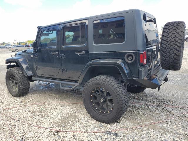 1J4BA5H12AL104094 - 2010 JEEP WRANGLER U SAHARA BLACK photo 2