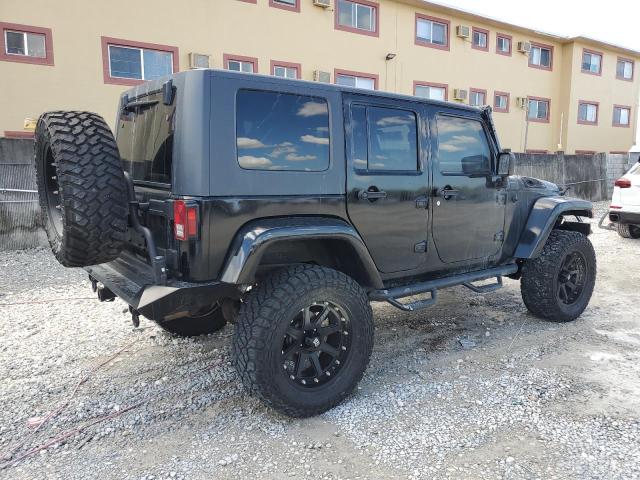 1J4BA5H12AL104094 - 2010 JEEP WRANGLER U SAHARA BLACK photo 3
