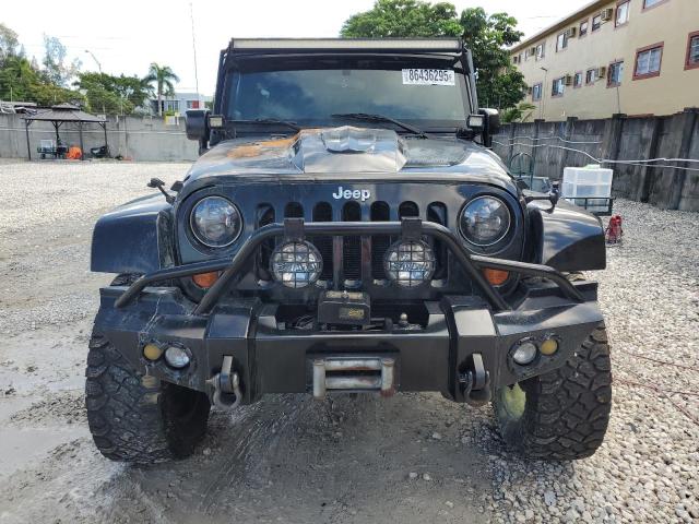 1J4BA5H12AL104094 - 2010 JEEP WRANGLER U SAHARA BLACK photo 5