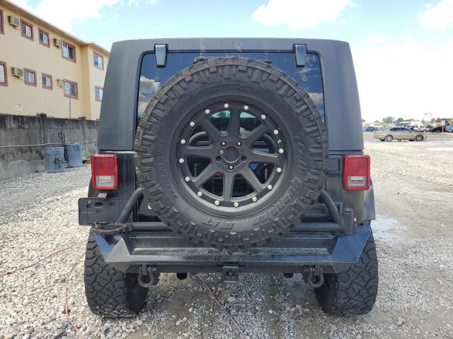 1J4BA5H12AL104094 - 2010 JEEP WRANGLER U SAHARA BLACK photo 6