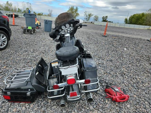 1HD1FC4177Y655368 - 2007 HARLEY-DAVIDSON FLHTCUI BLACK photo 4