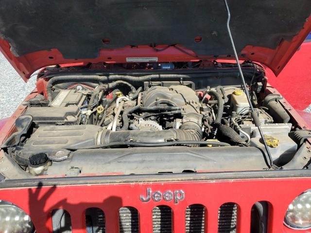 1C4BJWEG8CL262799 - 2012 JEEP WRANGLER U SAHARA RED photo 11
