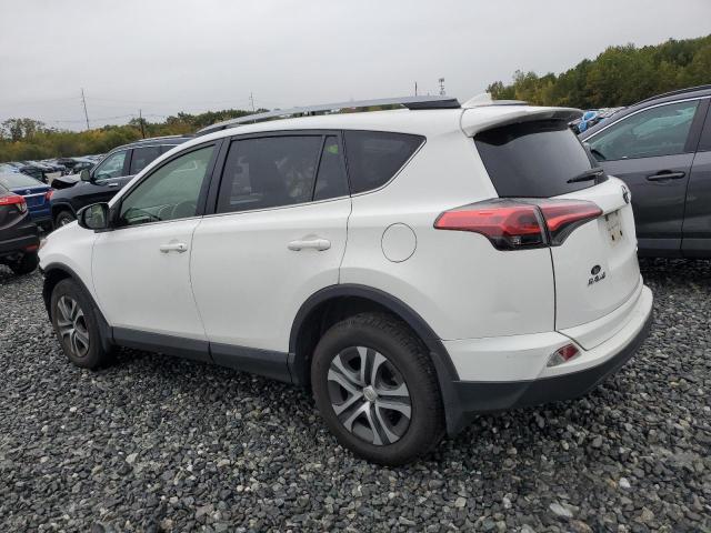 JTMBFREV6HJ147722 - 2017 TOYOTA RAV4 LE WHITE photo 2