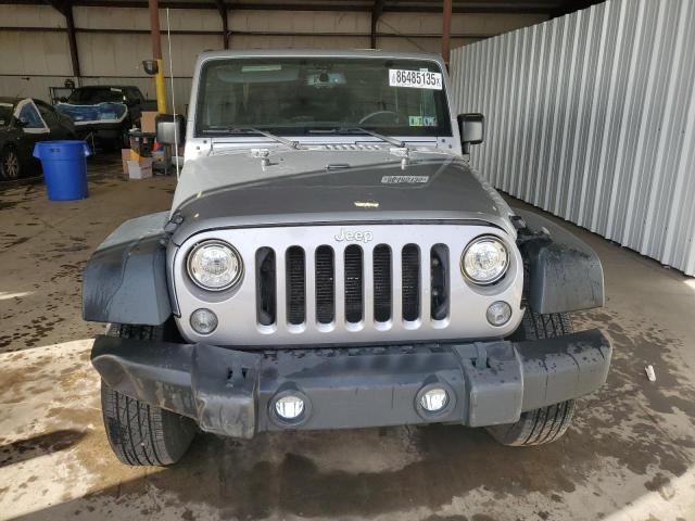 1C4BJWDG9HL618217 - 2017 JEEP WRANGLER U SPORT ვერცხლისფერი ფოტო 5