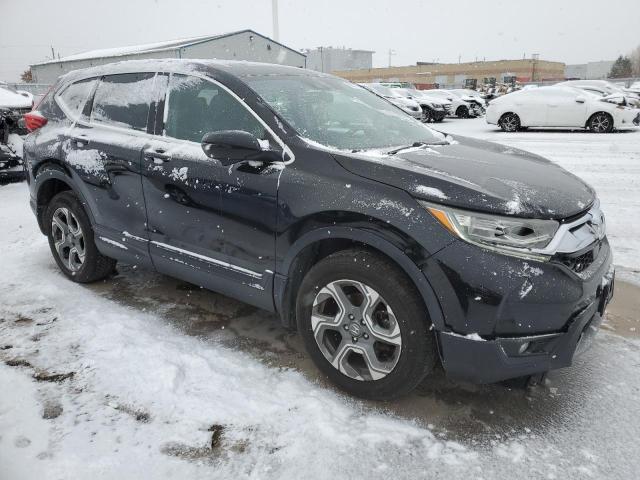 2HKRW2H80HH137921 - 2017 HONDA CR-V EXL BLACK photo 4