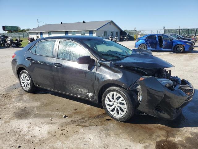 5YFBURHE0HP733054 - 2017 TOYOTA COROLLA L BLACK photo 4