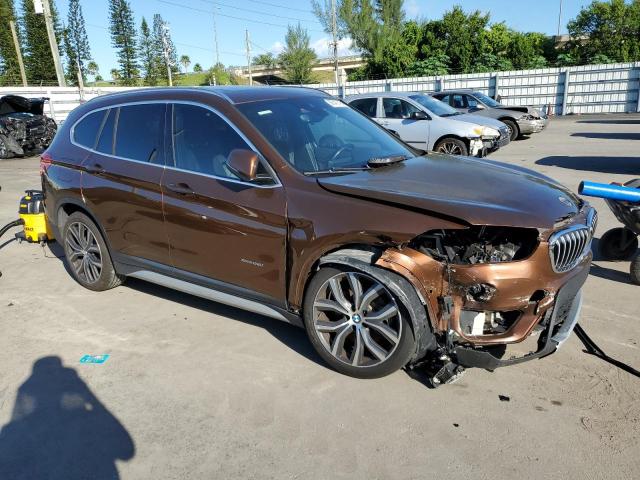 WBXHT3C31GP881023 - 2016 BMW X1 XDRIVE28I BROWN photo 4