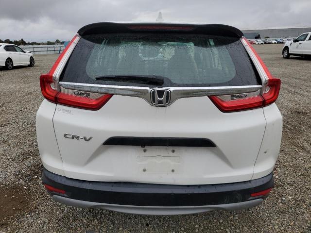 5J6RW5H32KL003348 - 2019 HONDA CR-V LX أبيض صورة 6
