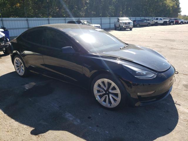 5YJ3E1EB1PF390388 - 2023 TESLA MODEL 3 BLACK photo 4