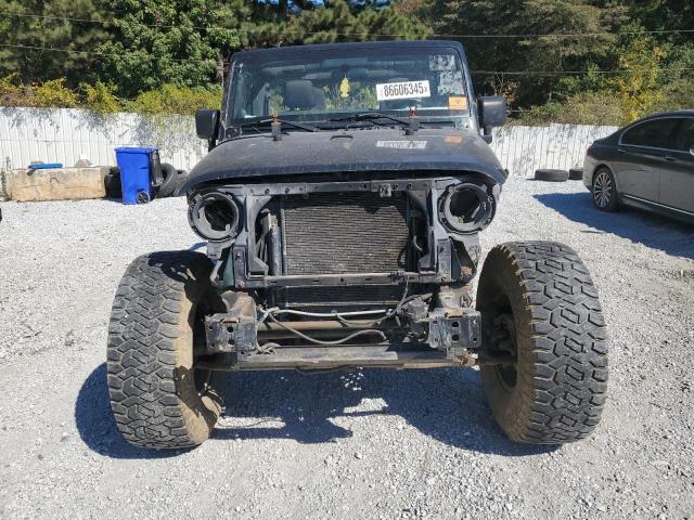1C4BJWEG0CL163460 - 2012 JEEP WRANGLER U SAHARA BLACK photo 5