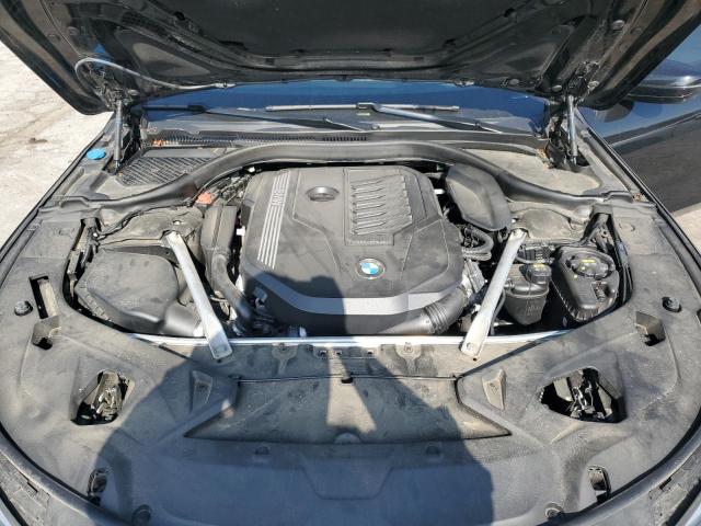 WBAGV4C0XNCG81857 - 2022 BMW 840XI BLACK photo 11