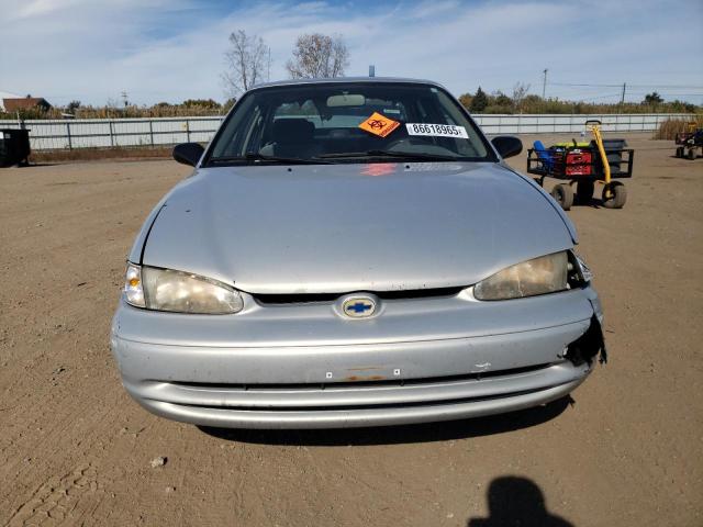 1Y1SK5286XZ440700 - 1999 CHEVROLET GEO PRIZM BASE SILVER photo 5