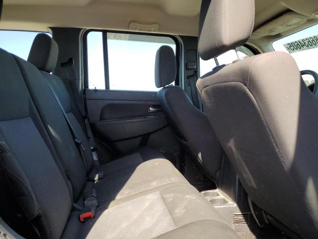 1J8GN28K49W516821 - 2009 JEEP LIBERTY SPORT BLACK photo 11