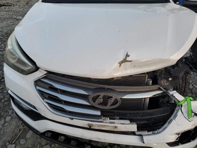 5NMZUDLB9HH016404 - 2017 HYUNDAI SANTA FE S أبيض صورة 12