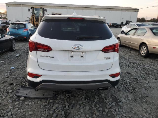 5NMZUDLB9HH016404 - 2017 HYUNDAI SANTA FE S أبيض صورة 6