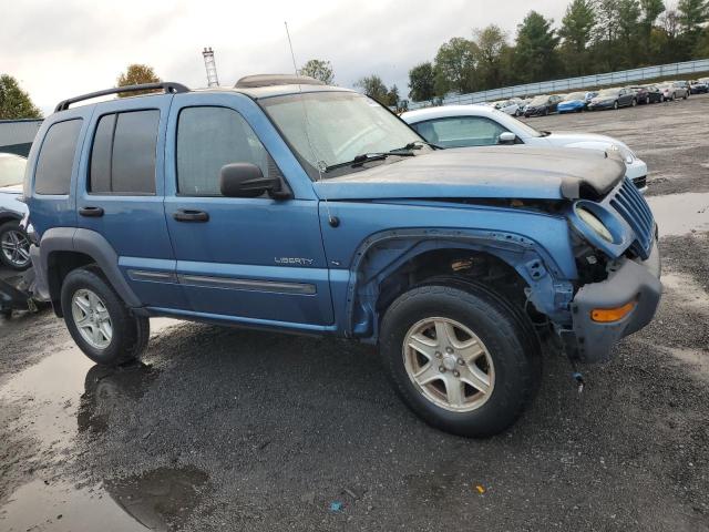 1J4GL48K74W275834 - 2004 JEEP LIBERTY SPORT BLUE photo 4