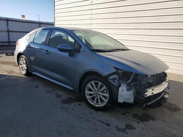 5YFB4MDE1PP004200 - 2023 TOYOTA COROLLA LE BLUE photo 4