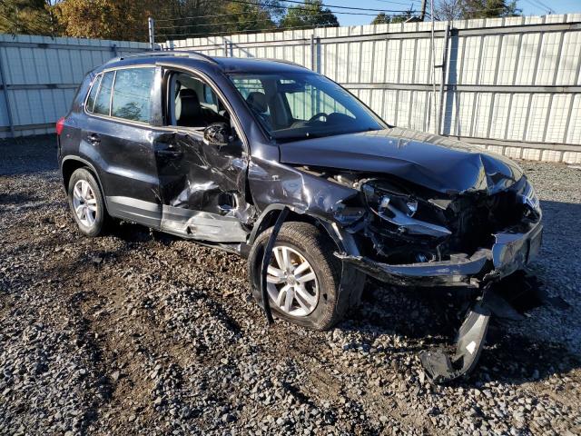 WVGBV7AX0HK013227 - 2017 VOLKSWAGEN TIGUAN S BLACK photo 4