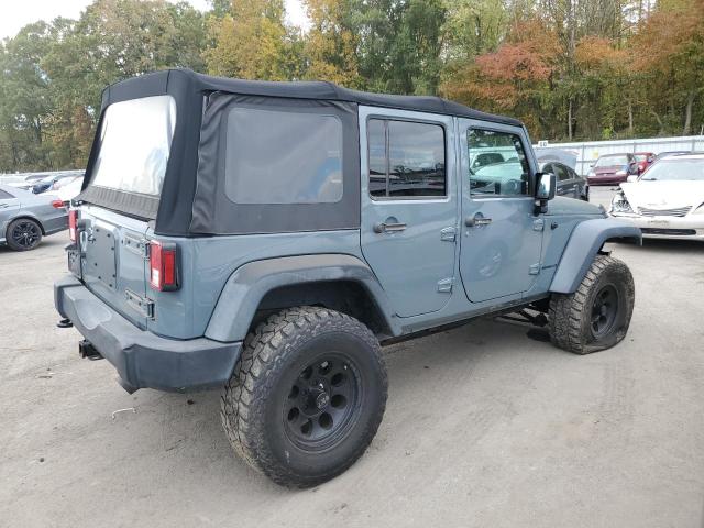 1C4BJWDG1EL311412 - 2014 JEEP WRANGLER U SPORT Gris photo 3