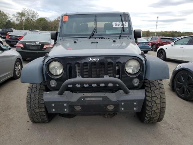 1C4BJWDG1EL311412 - 2014 JEEP WRANGLER U SPORT Gris photo 5