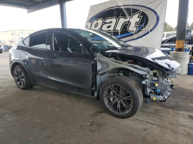 7SAYGDEEXSF308181 - 2025 TESLA MODEL Y GRAY photo 4