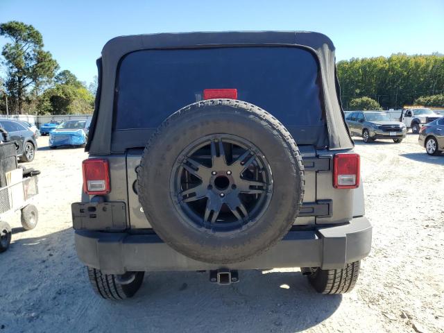 1C4BJWDG4GL328966 - 2016 JEEP WRANGLER U SPORT Gris foto 6