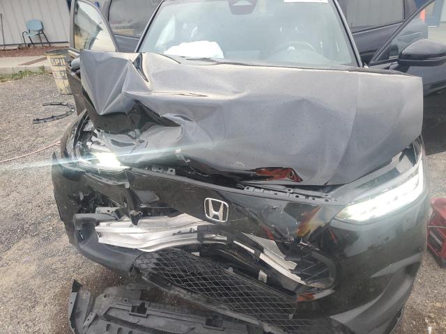 3CZRZ2H57PM717991 - 2023 HONDA HR-V SPORT Schwarz Foto 11