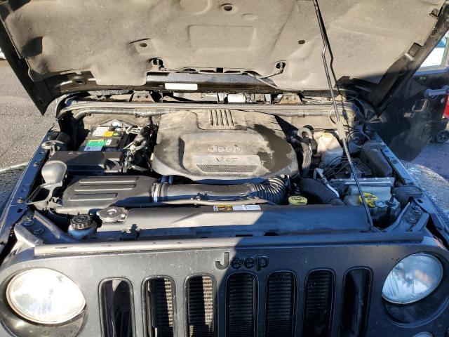 1C4BJWEG8EL312278 - 2014 JEEP WRANGLER U SAHARA BLACK photo 12