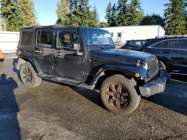 1C4BJWEG8EL312278 - 2014 JEEP WRANGLER U SAHARA BLACK photo 4