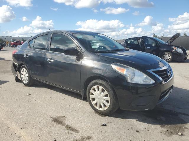 3N1CN7AP4GL821055 - 2016 NISSAN VERSA S BLACK photo 4