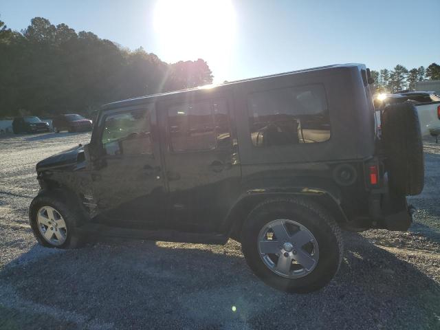 1J4GB59179L760028 - 2009 JEEP WRANGLER U SAHARA BLACK photo 2