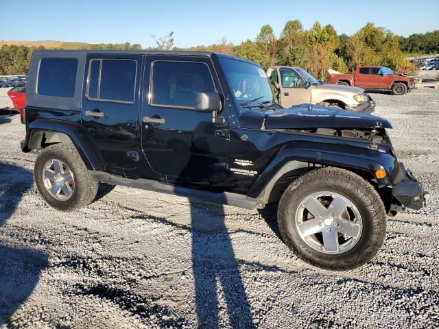 1J4GB59179L760028 - 2009 JEEP WRANGLER U SAHARA BLACK photo 4